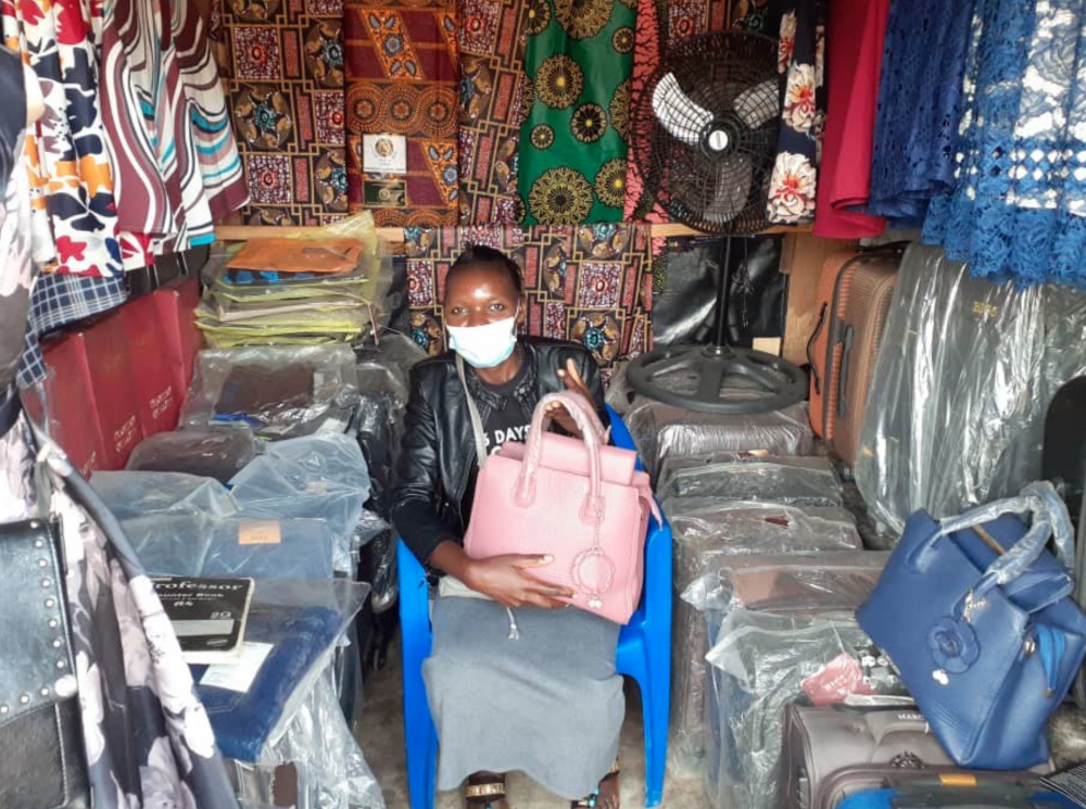 Woman selling products at the Karonga market